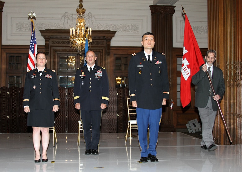 Lt. Col. David C. Park (center-right) assumed command of the USACE Philadelphia District from Lt. Col. Kristen N. Dahle (left) during a July 12, 2019 ceremony in the Wanamaker Building. Maj. Gen. Jeffrey L. Milhorn (left-center), commander of the North Atlantic Division, presided over the ceremony. Deputy District Engineer Nate Barcomb (right) was entrusted with passing the colors as part of the ceremony.