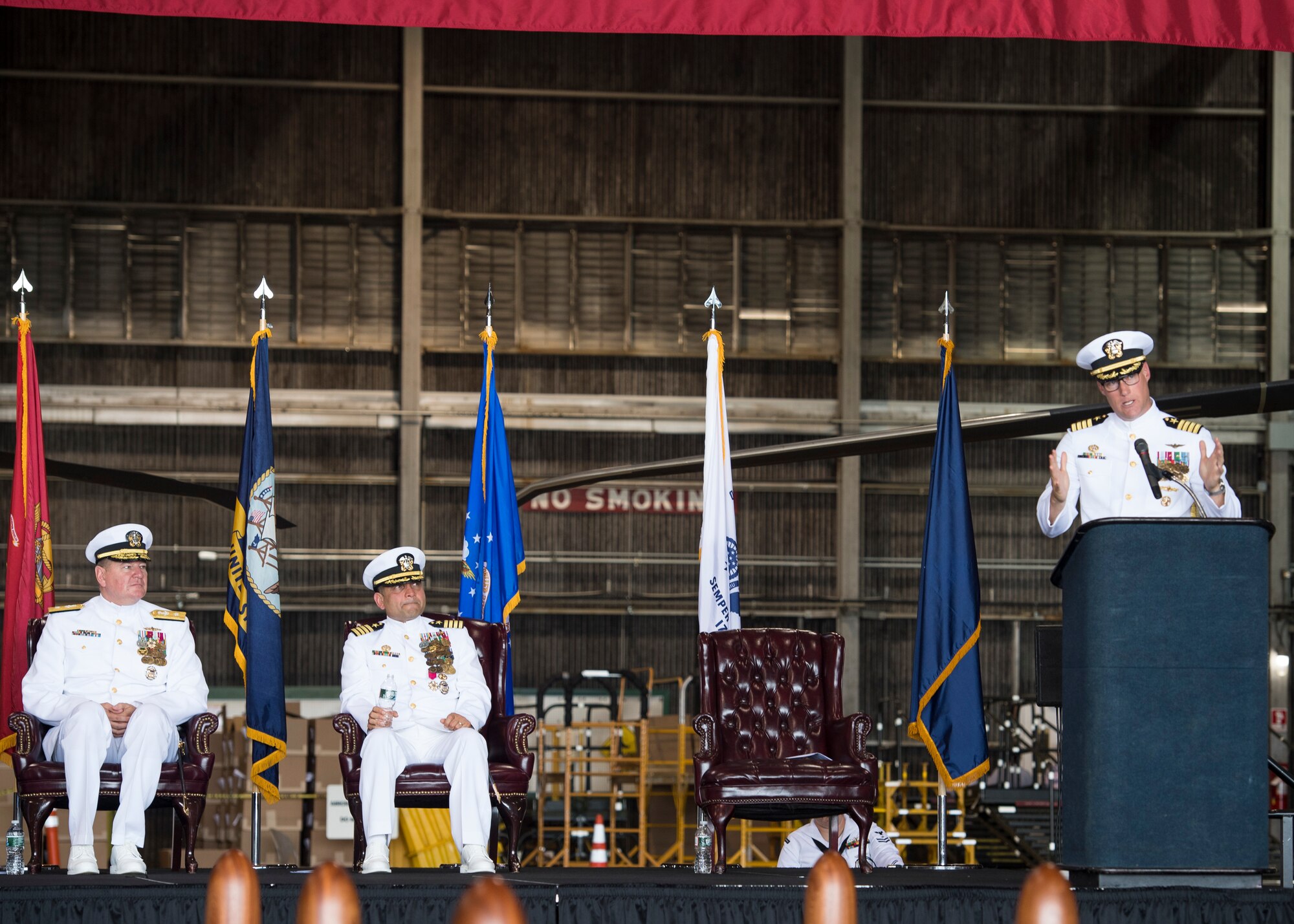 Incoming Naval Support Activity Lakehurst commander, U.S. Navy Capt. William Sherrod, gives a speech after accepting the responsibility of command from outgoing NSA Lakehurst commander, U.S. Navy Capt. Muhammed Khan, Joint Base McGuire-Dix-Lakehurst, New Jersey, July 12, 2019. Rear Adm. Charles Rock, commander of Navy Region Mid-Atlantic, presided over the ceremony.