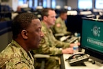 Army Master Sgt. Mark McCray reviews and updates information at the National Guard Coordination Center in Arlington, Virginia, July 12, 2019. McCray is serving in the NGCC during the National Guard’s response to Tropical Storm Barry.