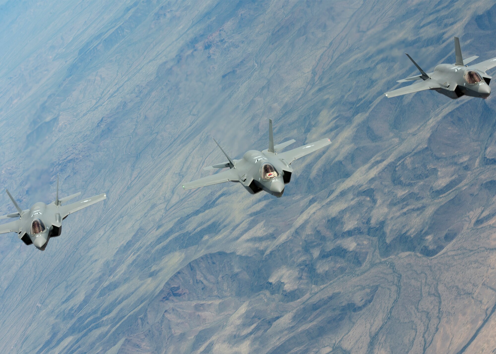 Republic of Korea Air Force, F-35A Lightning IIs fly in formation during a refueling mission March 15, 2019, in Ariz. The F-35’s sensor package is designed to collect, fuse and distribute more information than any fighter jet in history, giving pilots an advantage over all adversaries. (U.S. Air Force photo by Airman 1st Class Leala Marquez)