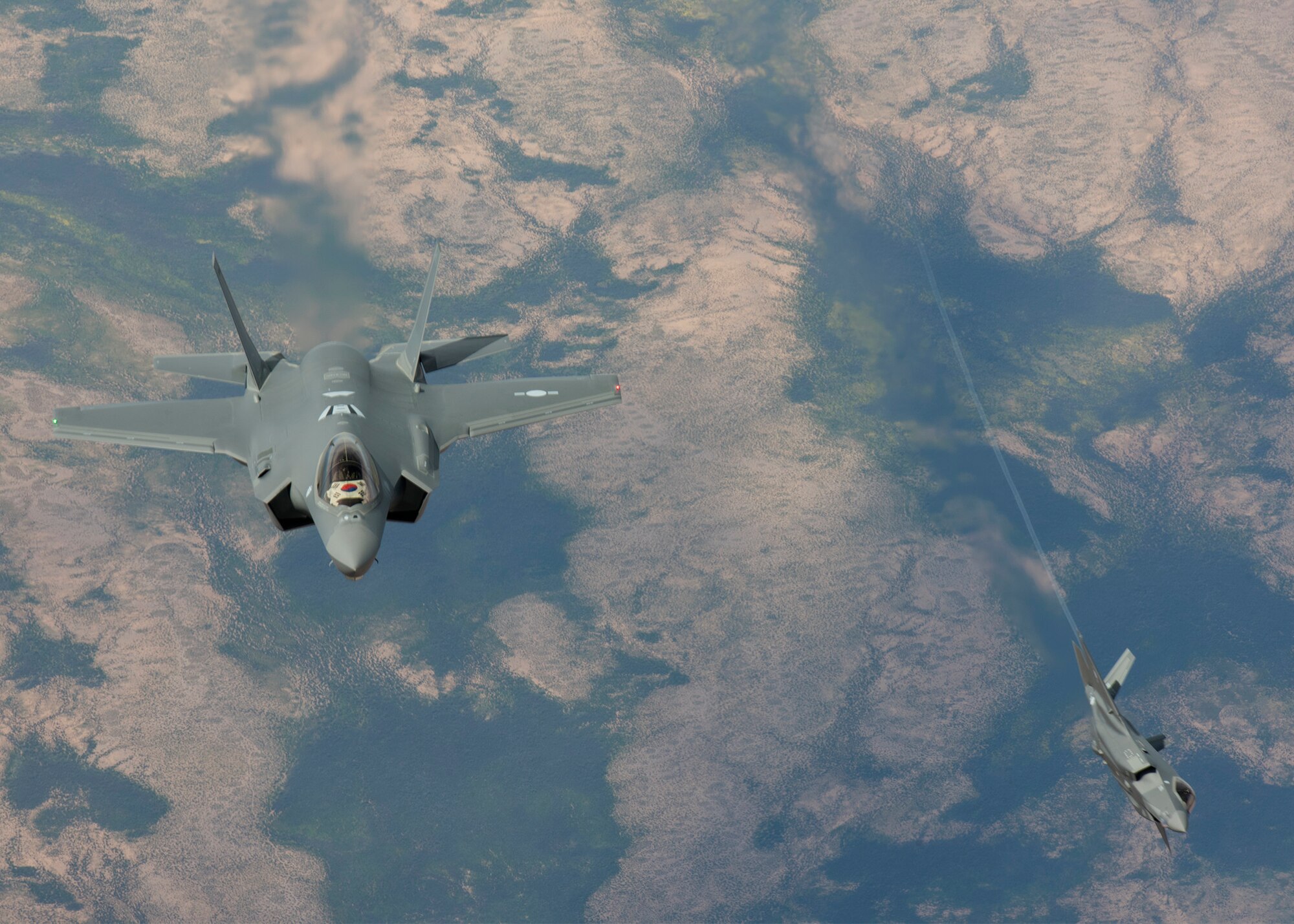 A Republic of Korea Air Force, F-35A Lightning II banks left during a refueling mission March 15, 2019, in Ariz. The aircraft’s electronic sensors contain the Electro-Optical Distributed Aperture System (DAS), a system that provides pilots with situational awareness in the area surrounding the aircraft for enhanced missile and aircraft warning, and day/night pilot vision. (U.S. Air Force photo by Airman 1st Class Leala Marquez)