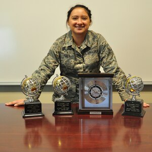 Senior Airman Savannah Perez’ three Airman of The Quarter Awards (left) and the JBSA Top Paralegal trophy (right) will grow by two soon. (Photo by Brian Lepley)