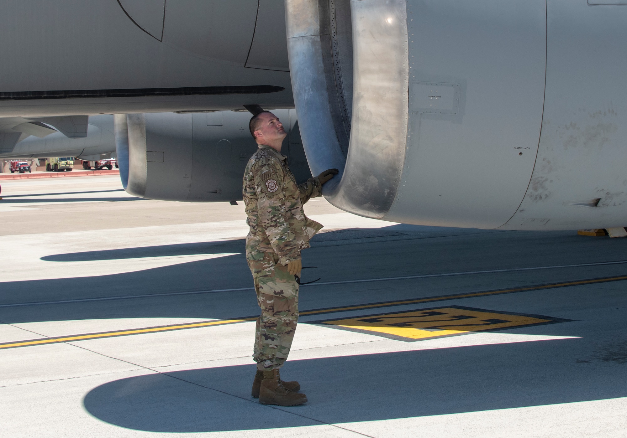 U.S. Air Force Tech. Sgt. Matthew Smith, 660th Aircraft Maintenance Squadron flying crew chief, conducts a final visual exterior check on a KC-10 Extender prior to takeoff July 11, 2019, at Travis Air Force Base, California. FCCs are responsible for a wide variety of maintenance duties while traveling with the aircraft including refueling, paperwork, routine maintenance and troubleshooting major issues. (U.S. Air Force photo by Heide Couch)