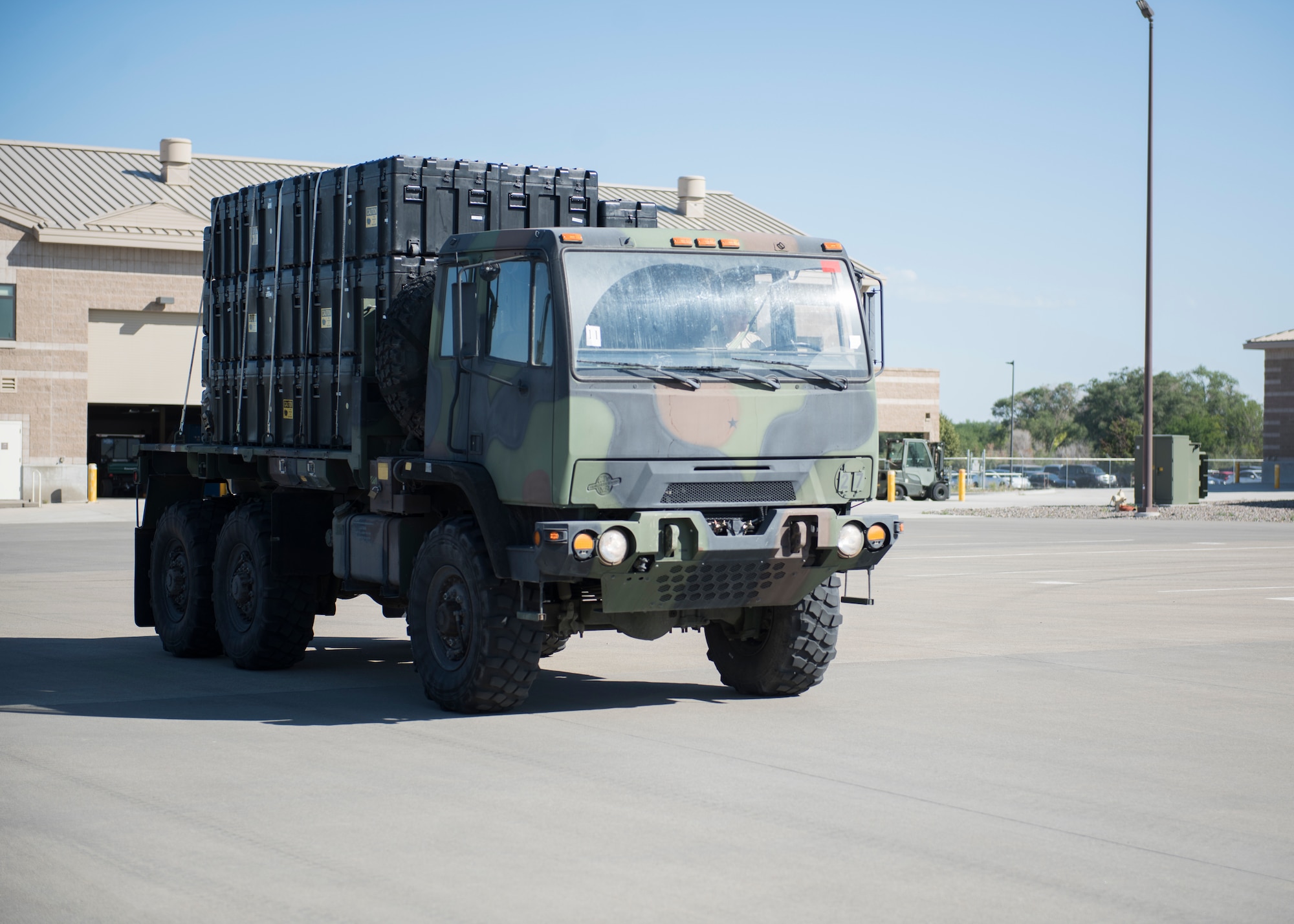 A Medium Tactical Vehicle travels accross the 726th Air Control Squadron during an exercise July 11, 2019, at Mountain Home Air Force Base, Idaho. The MTVs undergo an inspection before they are declaried road worthy for the exercise. (U.S. Air Force photo by Senior Airman Tyrell Hall)