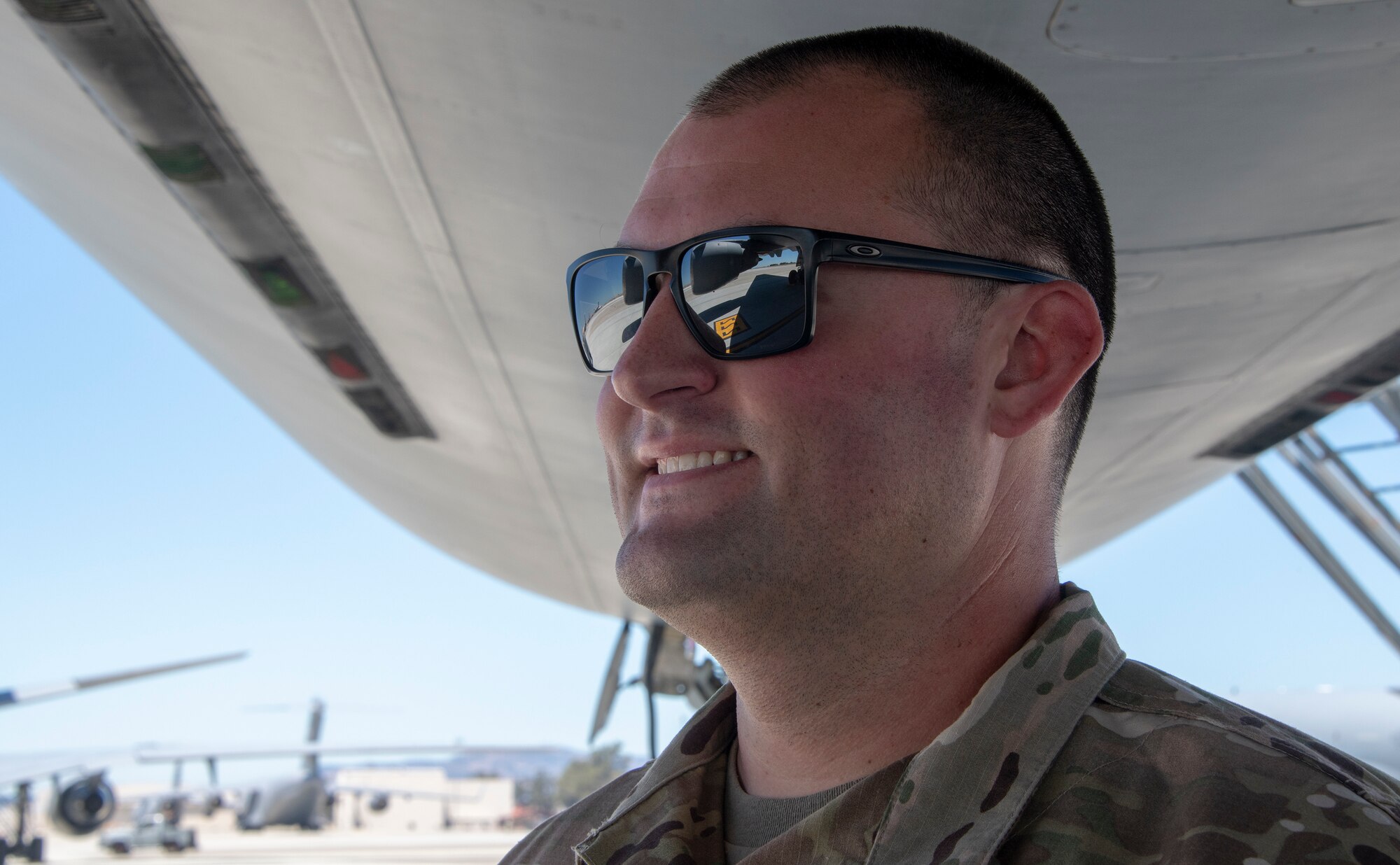 U.S. Air Force Tech. Sgt. Matthew Smith, 660th Aircraft Maintenance Squadron flying crew chief, visually checks the engine cowling on a KC-10 Extender prior to takeoff July 11, 2019, at Travis Air Force Base, California. FCCs are responsible for a wide variety of maintenance duties while traveling with the aircraft including refueling, paperwork, routine maintenance and troubleshooting major issues. (U.S. Air Force photo by Heide Couch)
