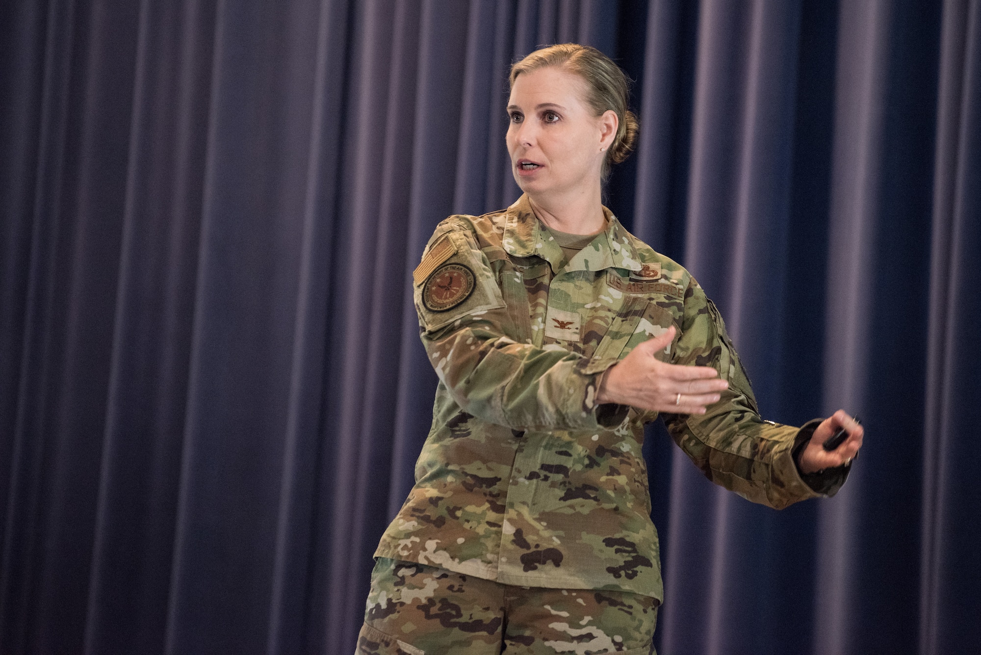 Col. Kelly Sams, assistant secretary of the Air Force Manpower and Reserve Affairs, senior military assistant, talks about the Line of the Air Force Promotion Category Configuration in a visit the SAF/MR made to Peterson Air Force Base, Colorado, July 9, 2019. The proposal places Line of the Air Force Specialty Codes into six new categories.