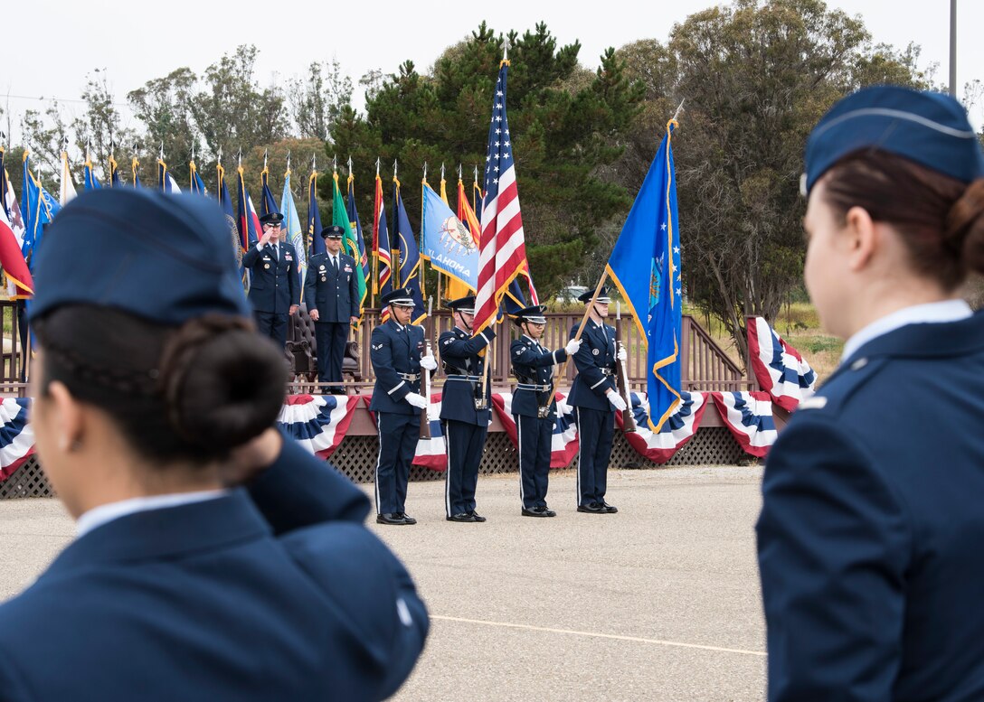 30th Space Wing members participate in a change of command ceremony July 12, 2019, at Vandenberg Air Force Base, Calif. During the ceremony, Col. Anthony J. Mastalir assumed command of the 30th Space Wing and will be in charge of operations for the Western Range, assuring continued access to space. (U.S. Air Force photo by Airman 1st Class Aubree Milks)