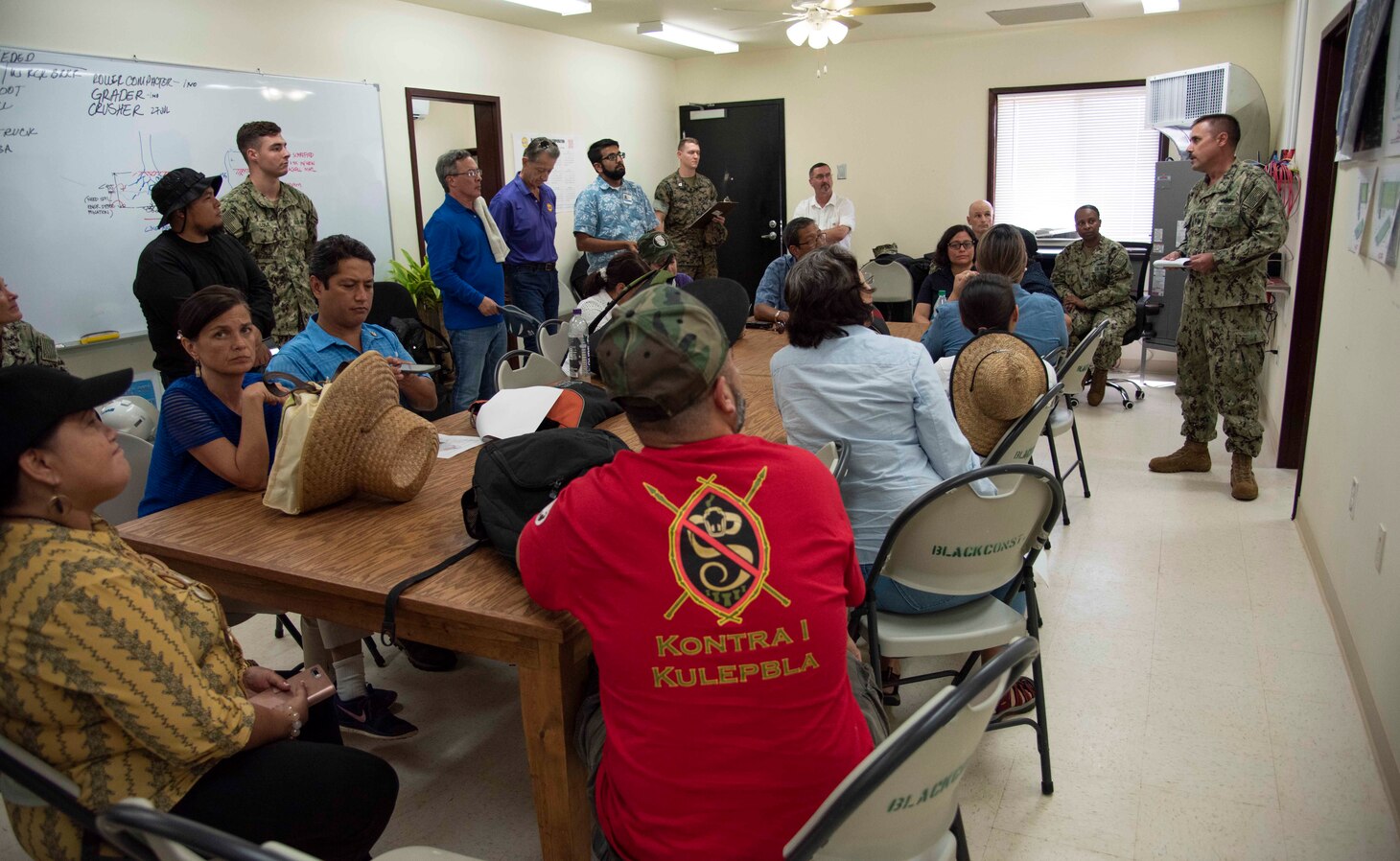 DEDEDO Guam (July 12, 2019) - Cmdr. Brian Foster, executive officer, Officer in Charge of Construction Marine Corps Marianas,  provides a safety brief to senators from the 35th Guam Legislature before a site visit at Northwest Field in Dededo July 12.  At the request of Sen. Tina Muna Barnes, speaker of the 35th Guam Legislature, Rear Adm. Shoshana Chatfield, commander, Joint Region Marianas and a team of Navy and Marine Corps environmental professionals led a senatorial visit to the site of the endangered Serianthes nelsonii tree at Northwest Field.  The group received a briefing from Marine Corps Activity Guam (MCAG) Environmental Director Al Borja and MCAG Natural Resources Specialist Lauren Gutierrez, and saw firsthand the military's commitment to environmental stewardship in the preservation of the island's ecosystem.