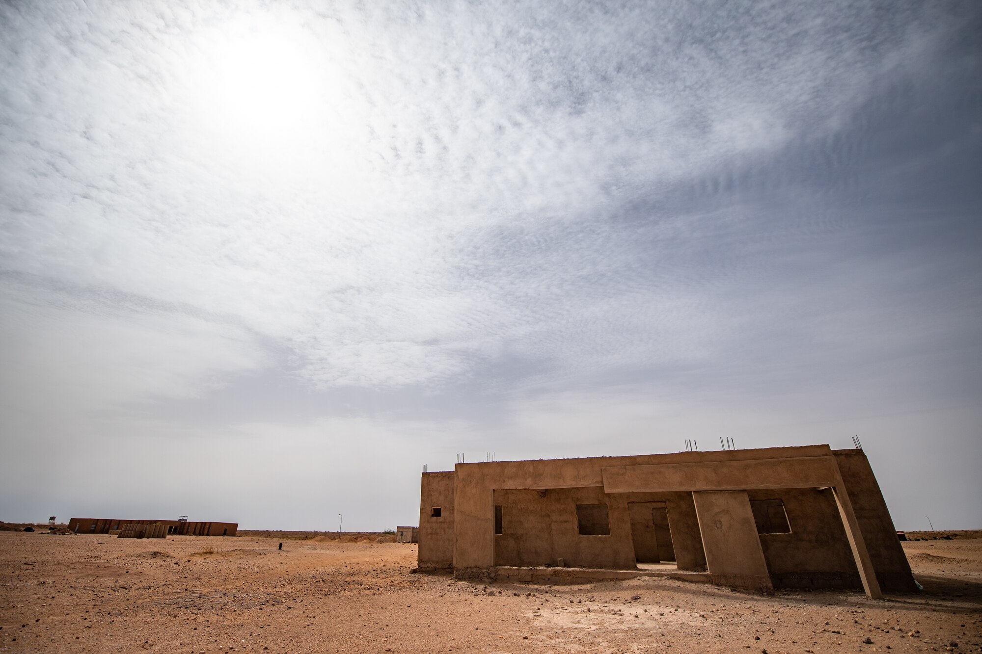 A training building stands in the Niger Armed Forces (French language: Forces Armées Nigeriennes) compound on Nigerien Air Base 201 in Agadez, Niger, July 10, 2019. The 409th Expeditionary Security Forces Squadron air advisors use the building to run training drills with the FAN. (U.S. Air Force photo by Staff Sgt. Devin Boyer)