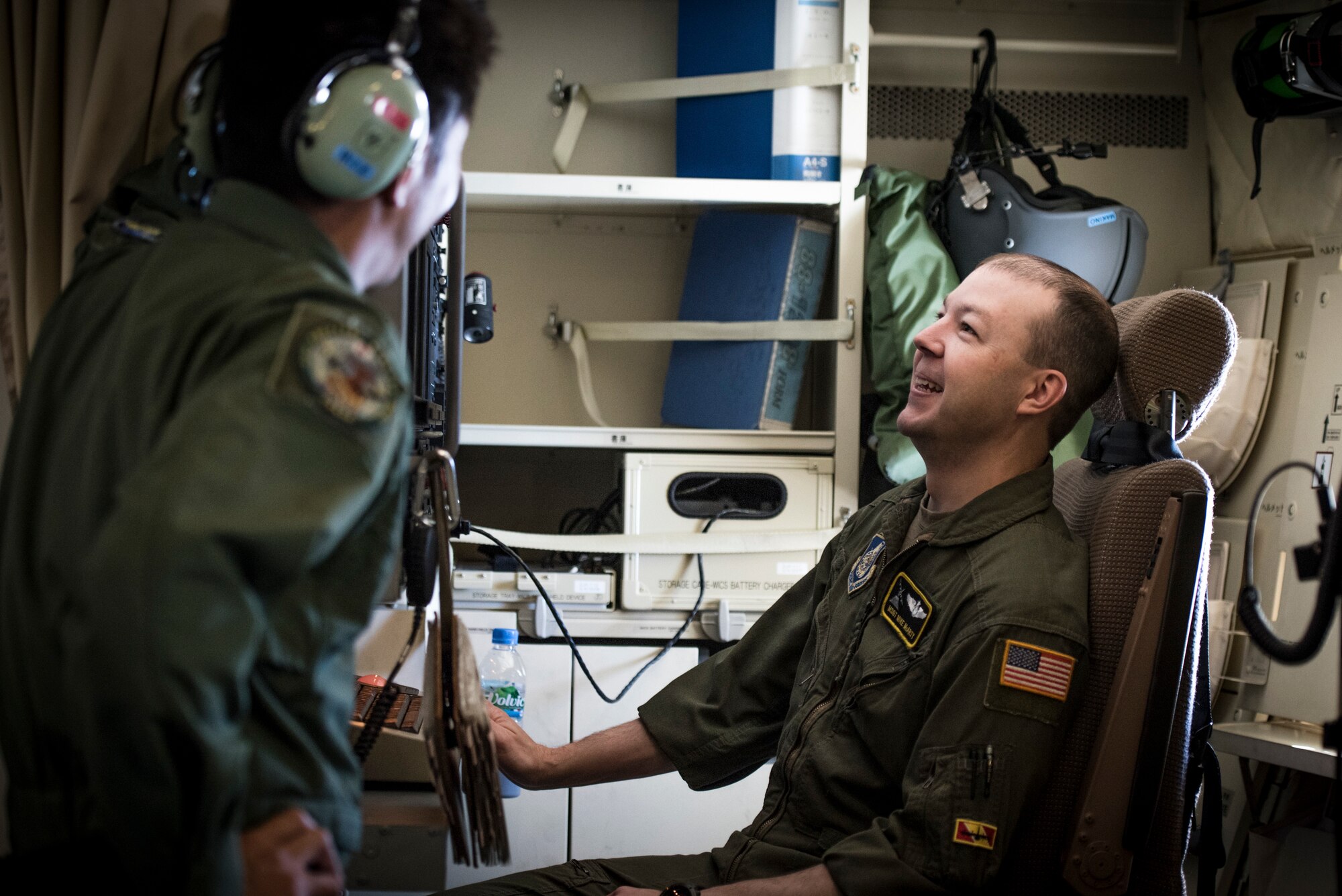Master Sgt. Michael McArty, 36th Airlift Squadron flight chief and C-130J evaluator, looks at a loadmaster station equipped with Japan Air Self-Defense Force C-2 assigned to 3rd Tactical Airlift Wing, 403rd Squadron, during a bilateral airlift exchange over Chubu region, Japan, July 10, 2019.
