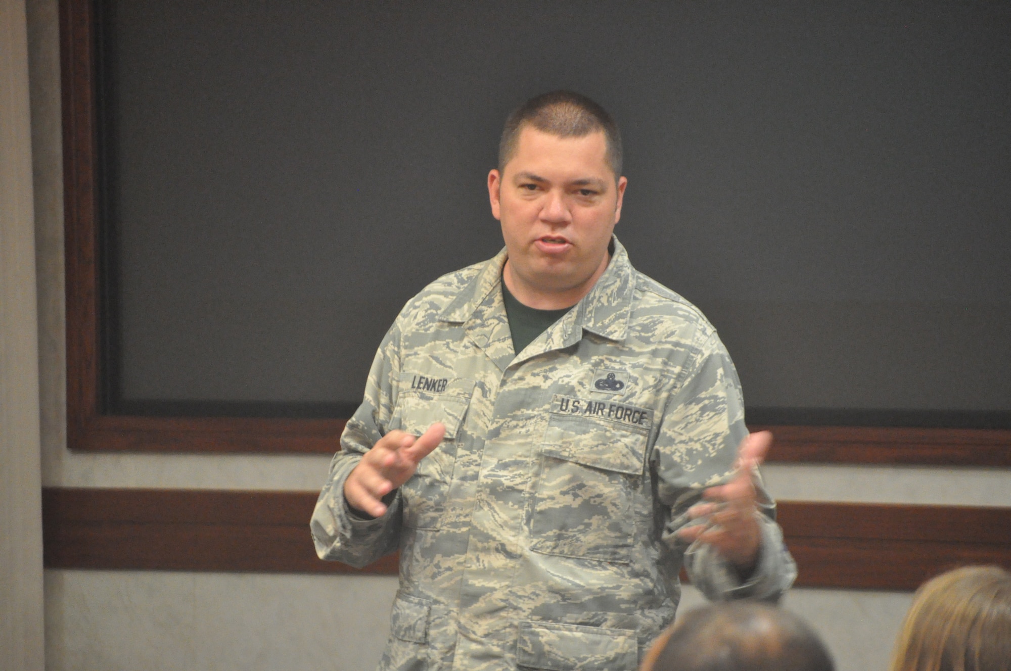 Operations Training and Procedures manager for the Flight Standards Agency, Master Sgt. Timothy Lenker, discusses how he became involved in teaching suicide prevention classes with the Wingman Day audience on June 21 in the Air Force Sustainment Center Anaconda Room. (U.S. Air Force photos/Megan Prather)