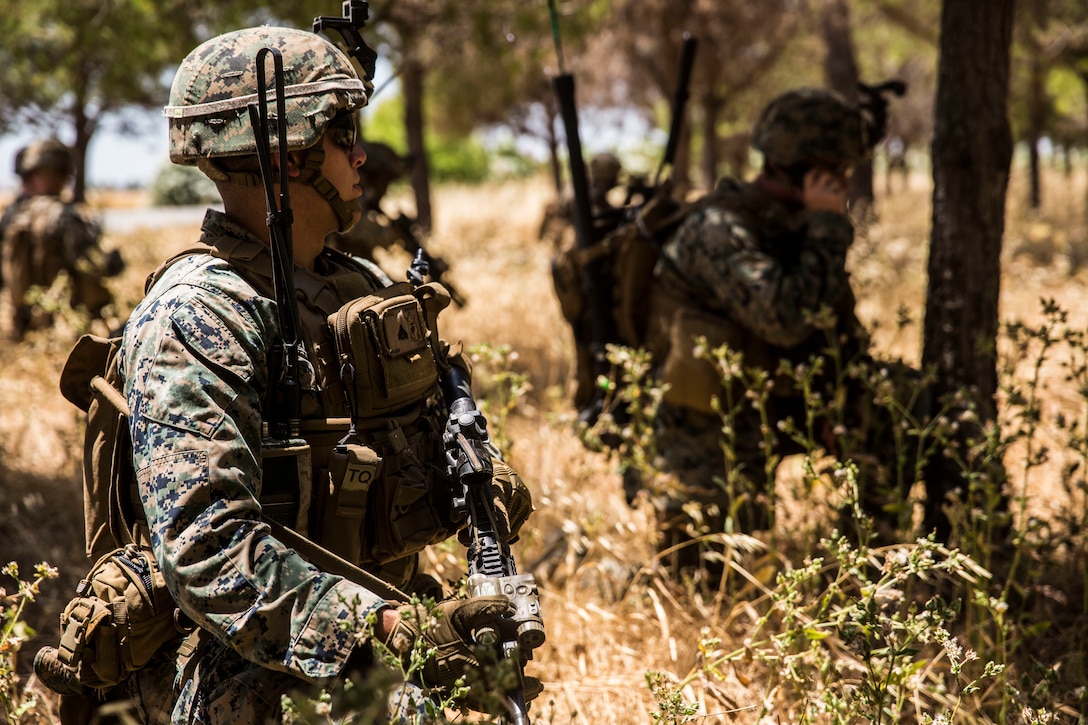 A U.S. Marine with Special Purpose Marine Air-Ground Task Force-Crisis Response-Africa 19.2, Marine Forces Europe and Africa, posts security during a tactical recovery of aircraft and personnel mission rehearsal on Moron Air Base, Spain, July 2, 2019.