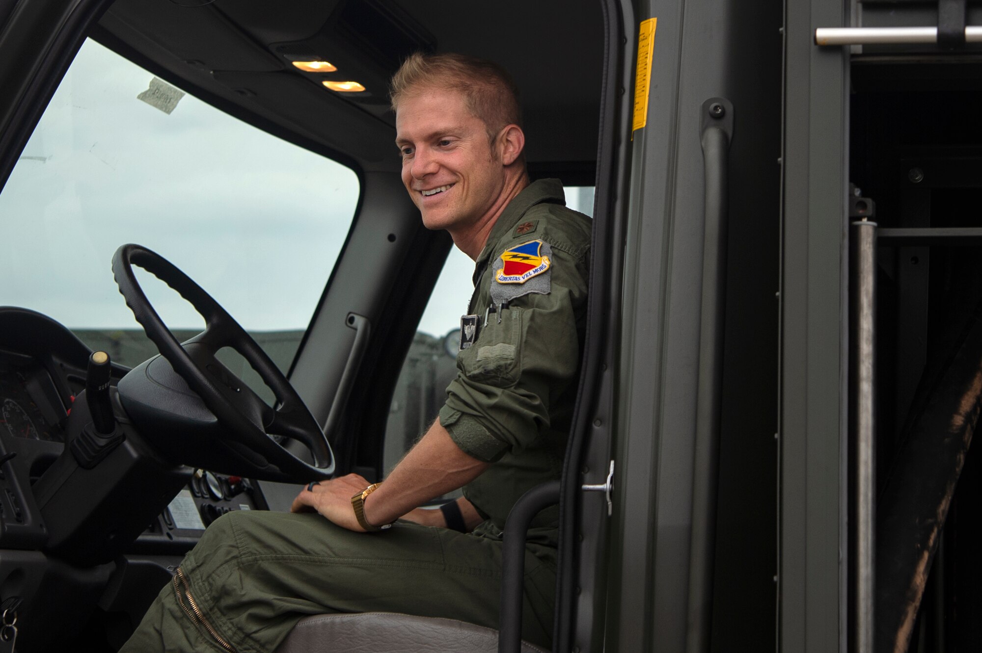 U.S. Air Force Maj. Michael Slotten, 421st Fighter Squadron F-35A Lightning II pilot, sits in a fuel truck at Spangdahlem Air Base, Germany, July 11, 2019. Slotten was stationed at Spangdahlem from 2004 to 2006 as an Airman first class fuels distributor operator. This was his first time driving a fuels truck since commissioning in 2008. (U.S. Air Force photo by Airman 1st Class Valerie Seelye)