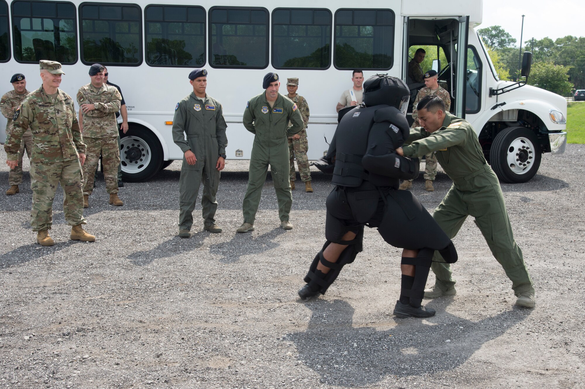 U.S. Army Command Sgt. Maj. John W. Troxell, senior enlisted advisor to the chairman of the Joint Chiefs of Staff, observes a combatives demonstration by members of the 6th Security Forces Squadron, during a MacDill Air Force Base visit, July 11, 2019.  The SEAC is the senior noncommissioned officer in the U.S. Armed Forces and serves as advisor to the chairman of the Joint Chiefs of Staff and the secretary of defense on all matters involving joint and combined total force integration. (U.S. Air Force photo by Airman 1st Class Shannon Bowman)