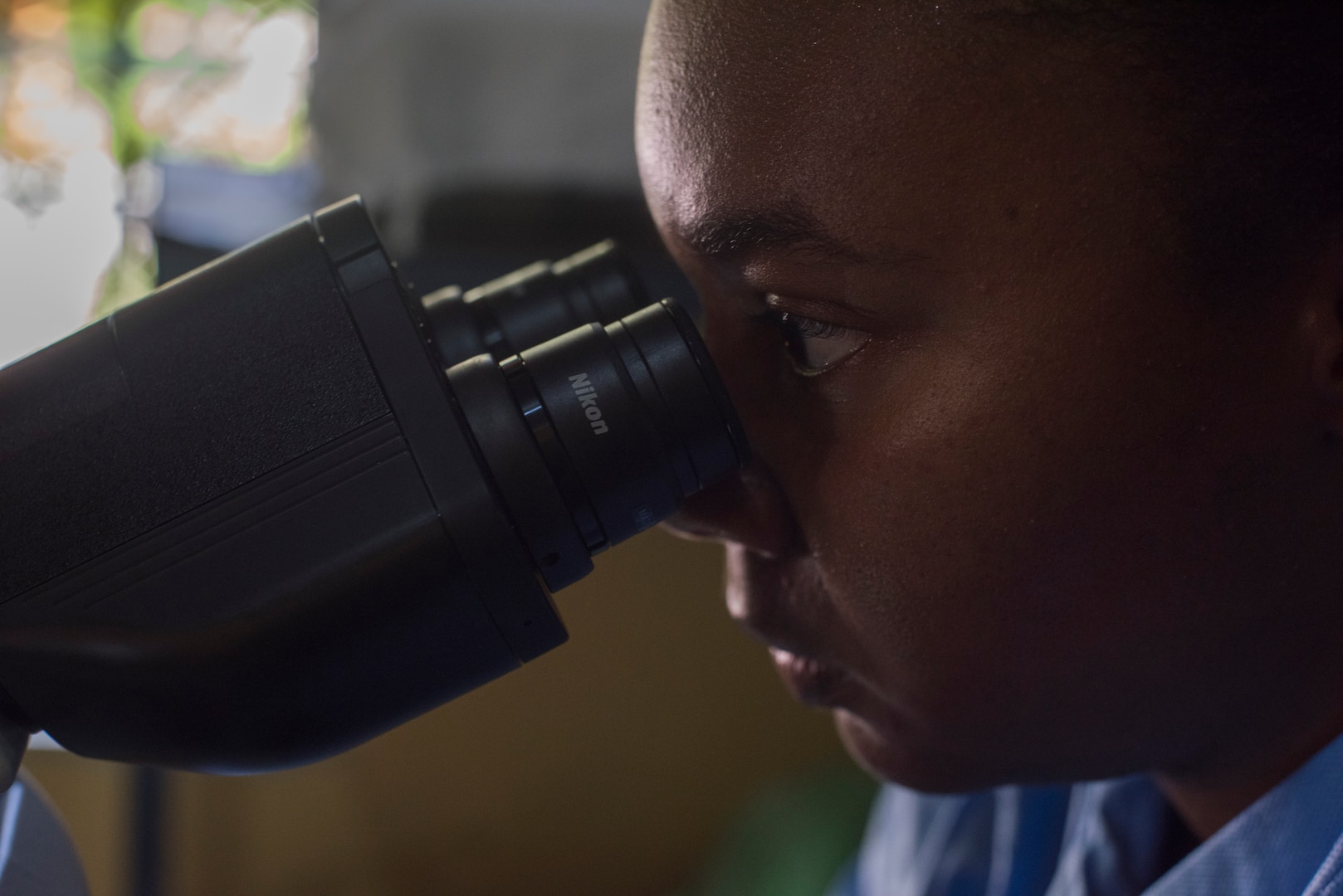 U.S. Army Sgt. Jazmaine Blakeney, Joint Task Force – Bravo Medical Element lab technician, examines tissue samples during an investigation, July 10, 2019, at La Libertad, Honduras. Members of JTF-B were asked by the Honduran Ministry of Health to conduct an investigation into the cause of Leishmaniasis and provide any recommendations that may stop infection. Leishmaniasis is a parasitic disease that is caused by infection with leishmania parasites, which are spread through the bite of sand flies. (U.S. Air Force photo by Staff Sgt. Eric Summers Jr.)