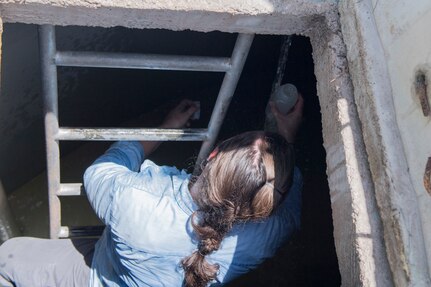 U.S. Army Spc. Marina Houff, Joint Task Force – Bravo Medical Element preventive medicine technician, takes water sample from a reservoir tank during a Leishmaniasis investigation, July 10, 2019, at La Libertad, Honduras. Members of JTF-B were asked by the Honduran Ministry of Health to conduct an investigation into the cause of Leishmaniasis and provide any recommendations that may stop infection. Leishmaniasis is a parasitic disease that is caused by infection with leishmania parasites, which are spread through the bite of sand flies.