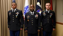 Command Sgt. Maj. Finis Dodson, U.S. Army Space and Missile Defense Command/Army Forces Strategic Command command sergeant major, center, stands with SMDC’s 2019 Best Warriors, Sgt. Chayse Burns, left, and Spc. Tanner Anderson, right, July 12 at the command’s Peterson Air Force Base, Colorado, headquarters following the ceremony announcing their wins. Burns is assigned to Headquarters and Headquarters Company, 53rd Signal Battalion, 1st Space Brigade, Fort Carson, Colorado, and Anderson is assigned to Company C, 53rd Signal Battalion, Landstuhl, Germany. (U.S. Army photo by Carrie David Campbell)