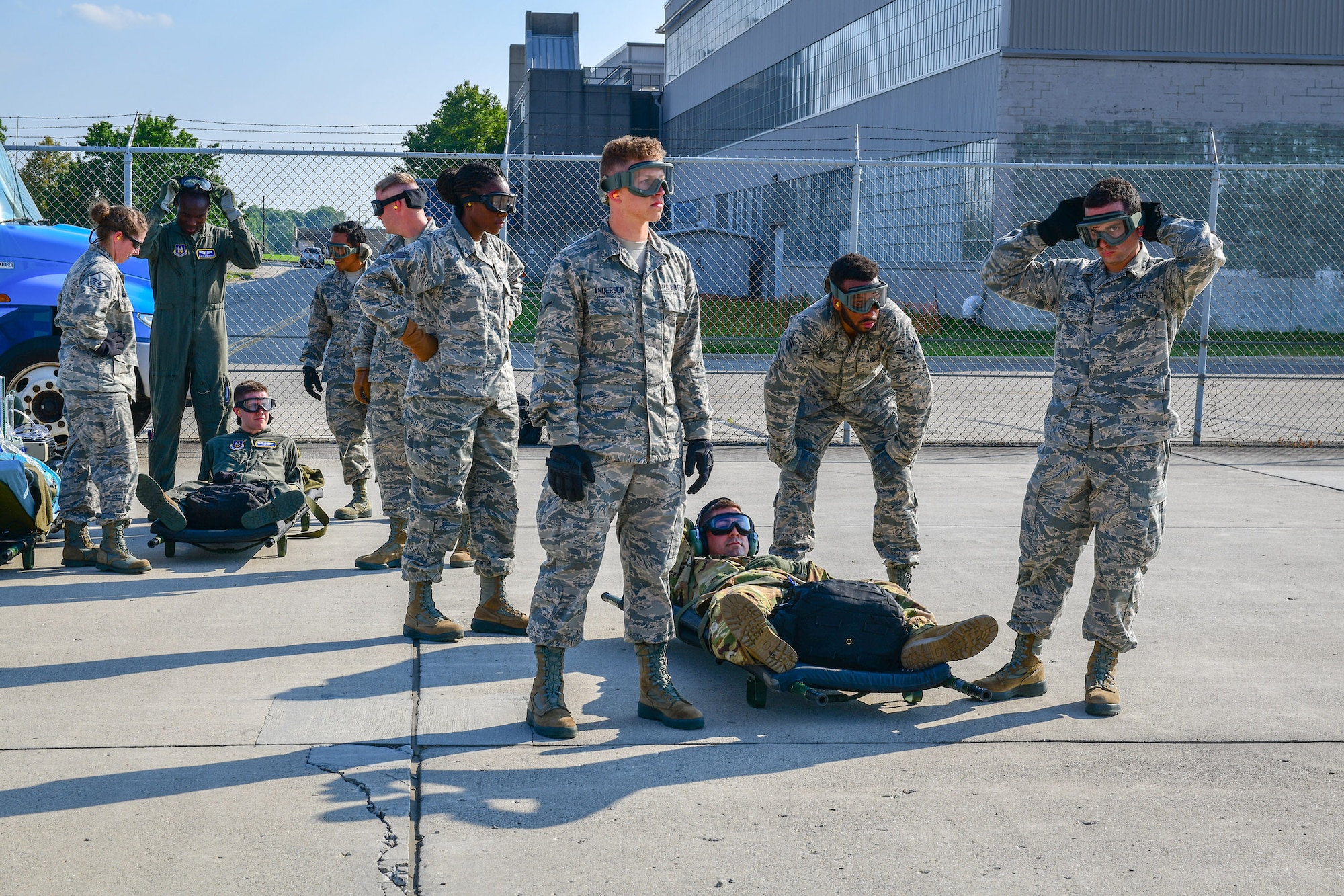 Reserve Citizen Airmen from the 445th Aeromedical Evacuation Squadron prepare to board a Youngstown Air Reserve Station C-130H Hercules aircraft on July 10, 2019, on the flightline at Wright-Patterson Air Force Base.