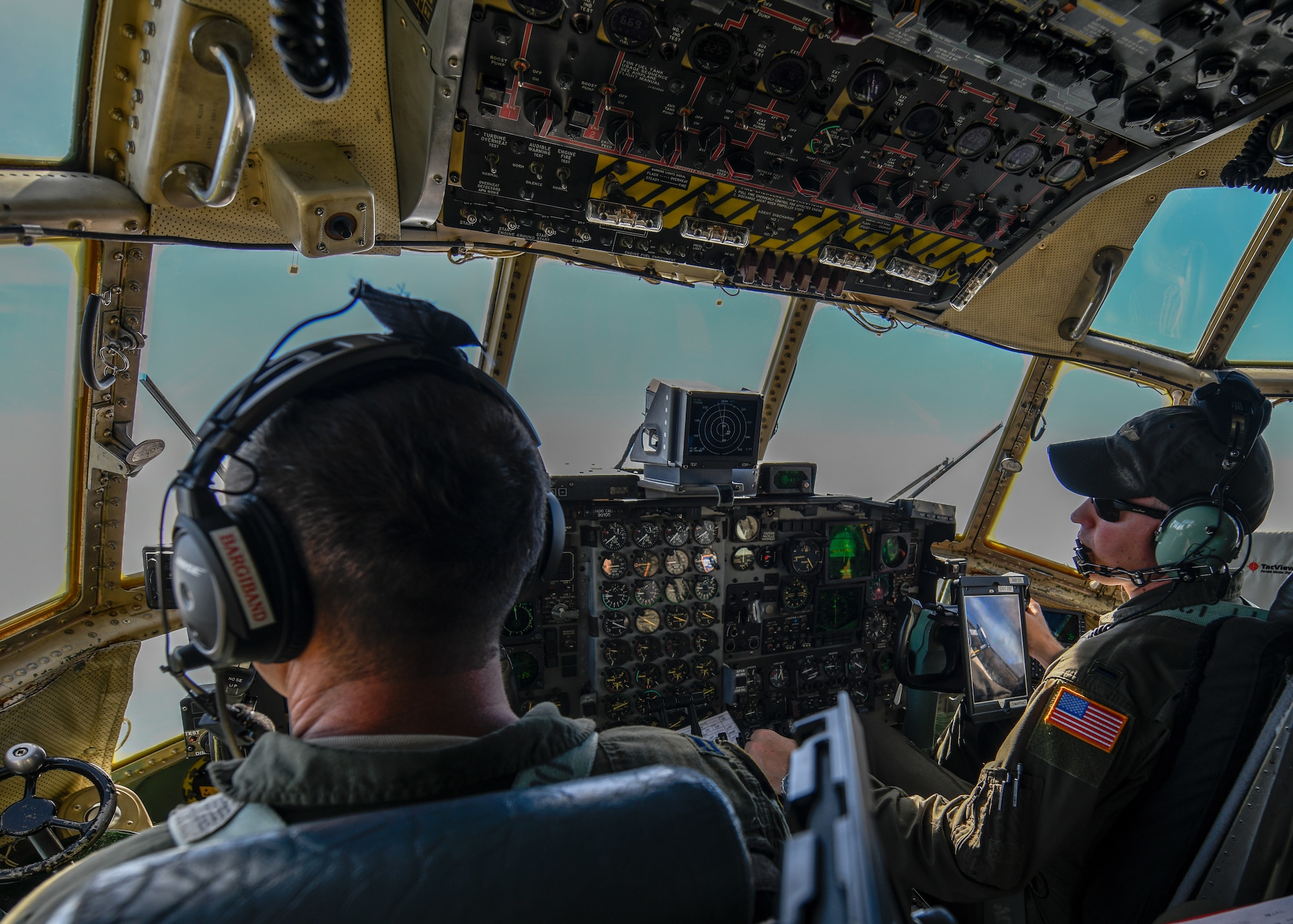 Capt. Nick Bargiband and 1st Lt. Timothy DiMarino, both pilots with the 757th Airlift Squadron here, fly a YARS C-130H Hercules en route to Wright-Patterson Air Force Base on July 10, 2019.