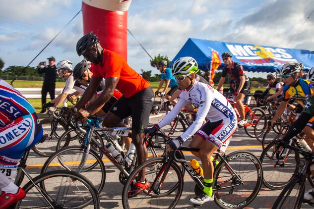 Status of Forces Agreement personnel and Okinawan residents begin the 2019 Futenma Bike Race on Marine Corps Air Station Futenma, Okinawa, Japan, July 14, 2019. The race invites Status of Forces Agreement personnel and the local Okinawan community to compete in race on and around MCAS Futenma’s airfield.
