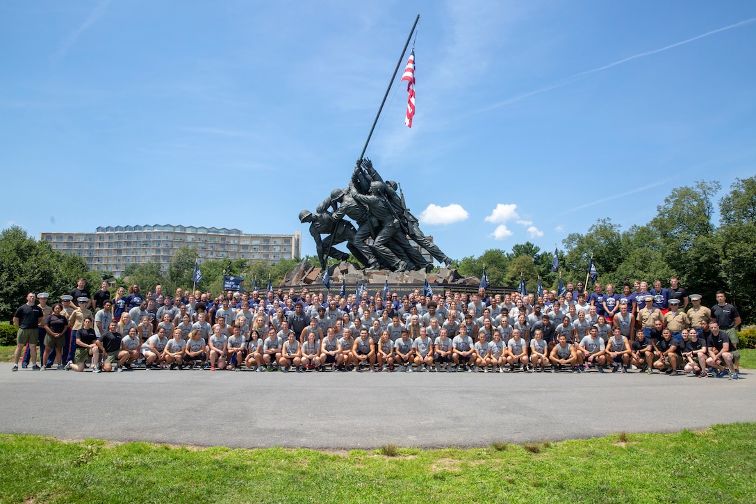 Semper Fidelis All-Americans pose for a group photo at the U.S. Marine Corps War Memorial during the Battles Won Academy in Washington, D.C., July 14, 2019. The Battles Won Academy is a part of the Marine Corps’ Semper Fidelis All-American Program, which recognizes young men and women who excel in athletics, but have also shown themselves to be leaders in the classroom and in their communities. Nearly 100 high school student-athletes were selected to attend the academy, which runs through July 14 and focuses on developing their self-confidence, discipline, teamwork, and honing the fighting spirit that embodies the Marine Corps. (U.S. Marine Corps photo by Lance Cpl. Mitchell Collyer)