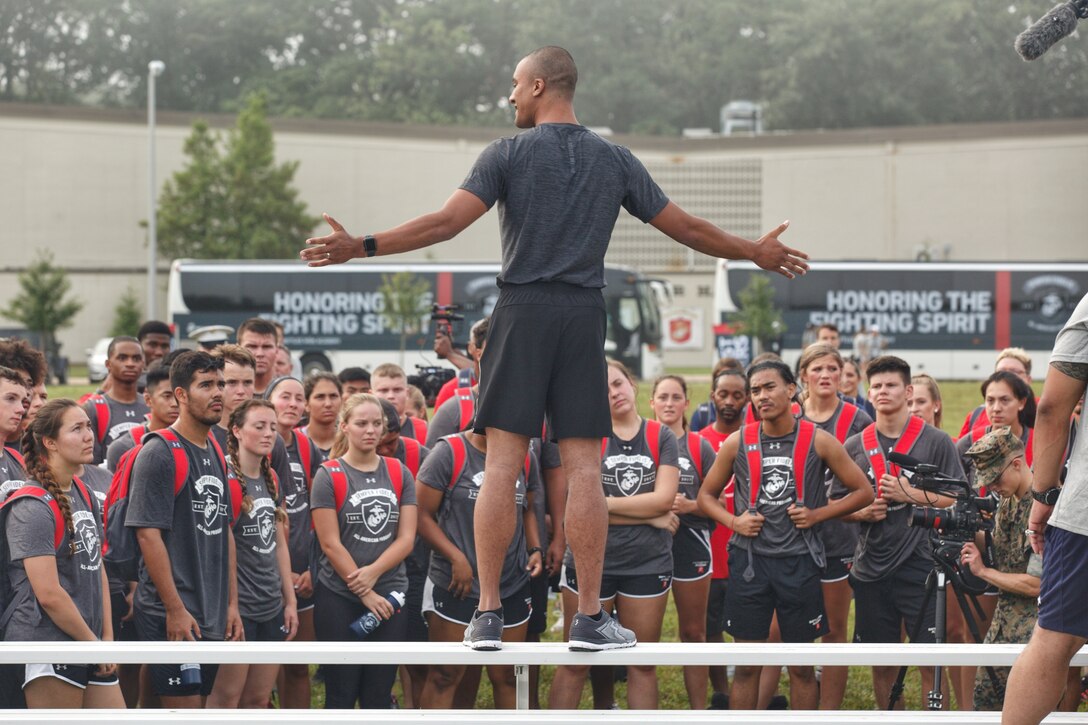 Two-time Olympic gold medalist Ashton Eaton addresses student-athletes and their mentors during the Battles Won Academy at Marine Corps Base Quantico, Virginia, July 12, 2019. The Battles Won Academy is a part of the Marine Corps’ Semper Fidelis All-American Program, which recognizes young men and women who excel in athletics, but have also shown themselves to be leaders in the classroom and in their communities. Nearly 100 high school student-athletes were selected to attend the academy, which runs through July 14 and focuses on developing their self-confidence, discipline, teamwork, and honing the fighting spirit that embodies the Marine Corps. (U.S. Marine Corps photo by Staff Sgt. Bryan Nygaard)