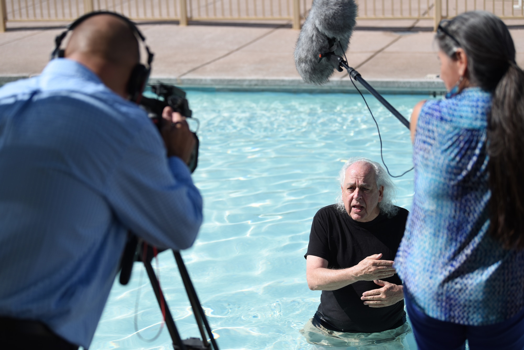 Leonard Jones, Air Force Safety Center Air Force Risk Management Program manager, explains how to escape a riptide for a public service announcement at Kirtland Air Force Base, N.M., July 11, 2019. The PSA will be shown on social media, the Armed Forces Network and online. (U.S. Air Force photo by Senior Airman Eli Chevalier)