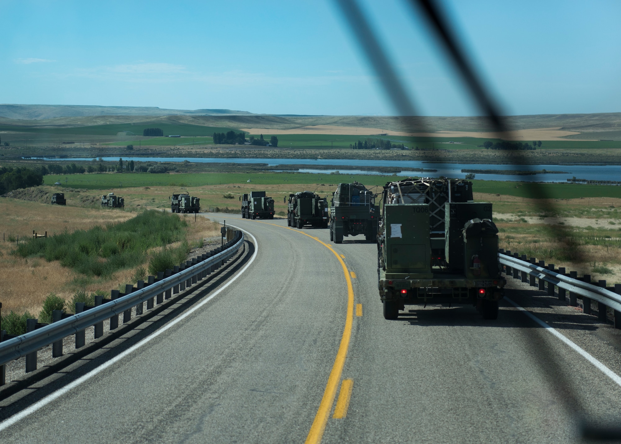 A U.S. Air Force convoy of 5-ton trucks from the 726th Air Control Squadron transports a variety of equipment July 14, 2019, near Mountain Home Air Force Base, Idaho. This convoy was in support of Hardrock Exercise 19-2, where supplies on the truck enabled the 726th ACS Airmen to set up an entirely self-sufficient base in a simulated remote location. (U.S. Air Force photo by Airman 1st Class Andrew Kobialka)