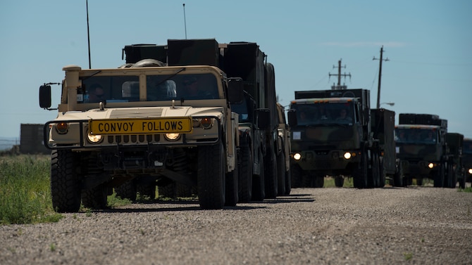 A U.S. Air Force convoy of 5-ton trucks from the 726th Air Control Squadron transports a variety of equipment July 14, 2019, near Mountain Home Air Force Base, Idaho. This convoy was in support of Hardrock Exercise 19-2, where supplies on the truck enabled the 726th ACS Airmen to set up an entirely self-sufficient base in a simulated remote location. (U.S. Air Force photo by Airman 1st Class Andrew Kobialka)