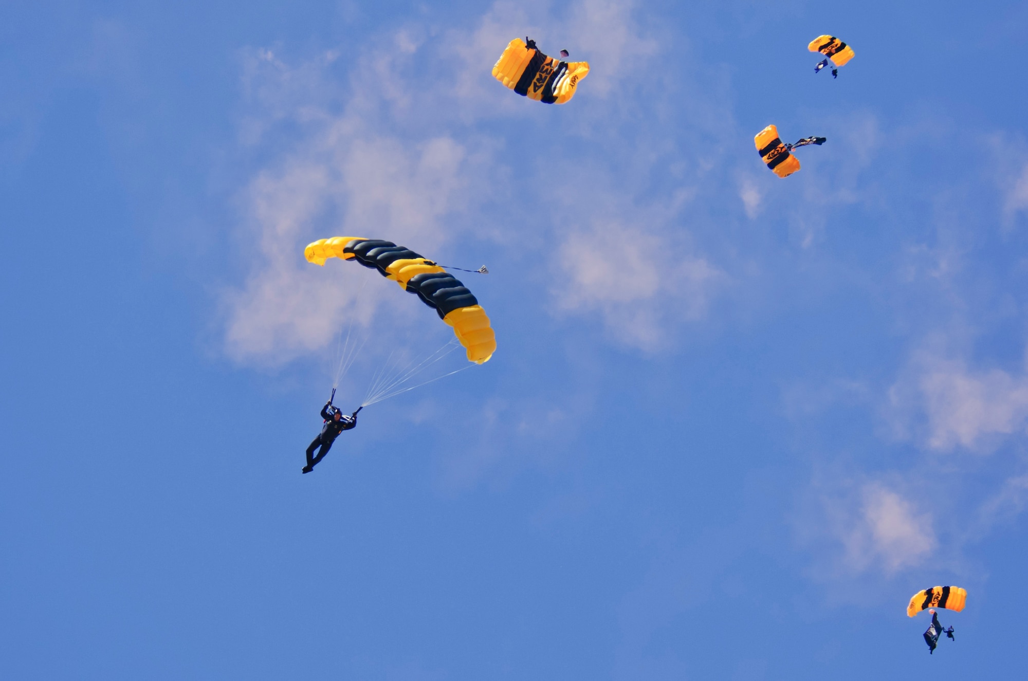 The U.S. Army Golden Knights parachute team perform July 13, 2019, at the “Mission Over Malmstrom” open house event on Malmstrom Air Force Base, Mont.