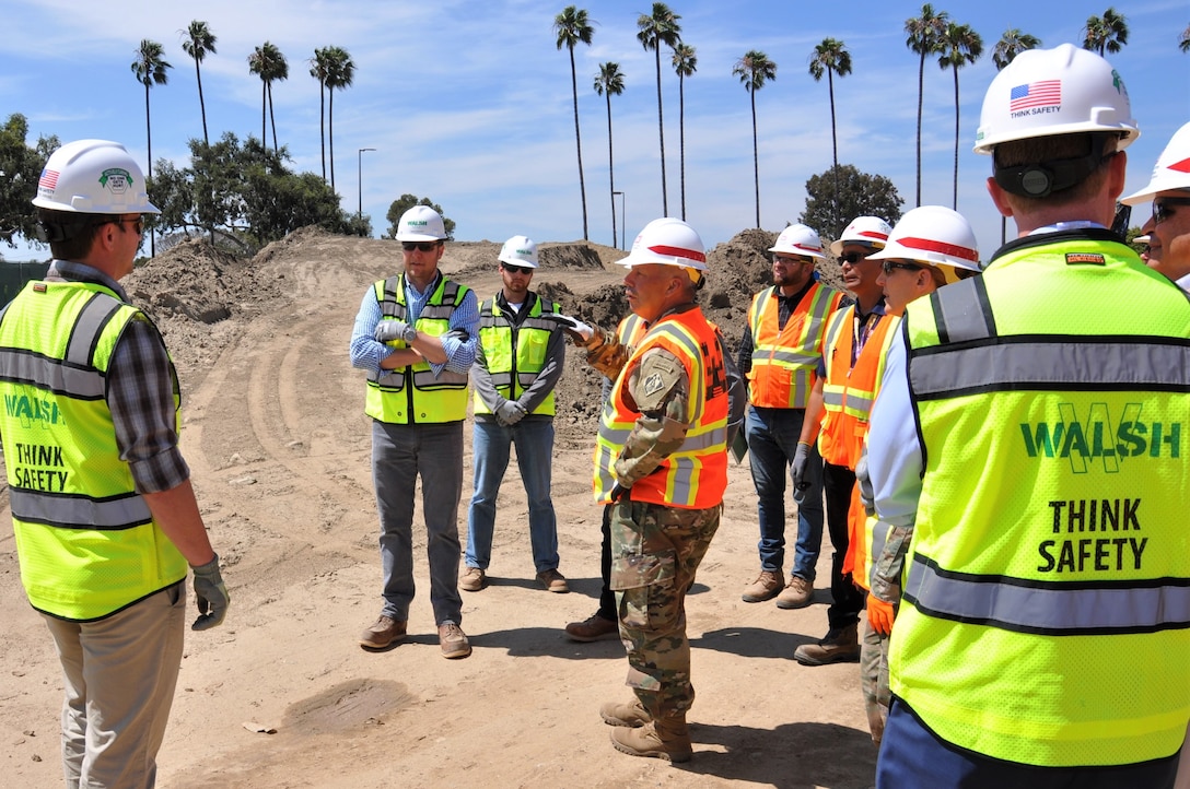 Lt. Gen. Todd T. Semonite, U.S. Army Corps of Engineers commanding general, center, talks to engineers and project managers with the Corps and its contractor, Walsh Construction, during a July 9 site visit to the Long Beach VA Healthcare System Medical Center in Long Beach, California. The Corps is constructing a five-phase, $317-million-project at the center, which includes a mental health in-patient/out-patient facility, community living center, parking structure, combined heat-and-power generation plant and demolition of the existing mental health and community living center buildings.
