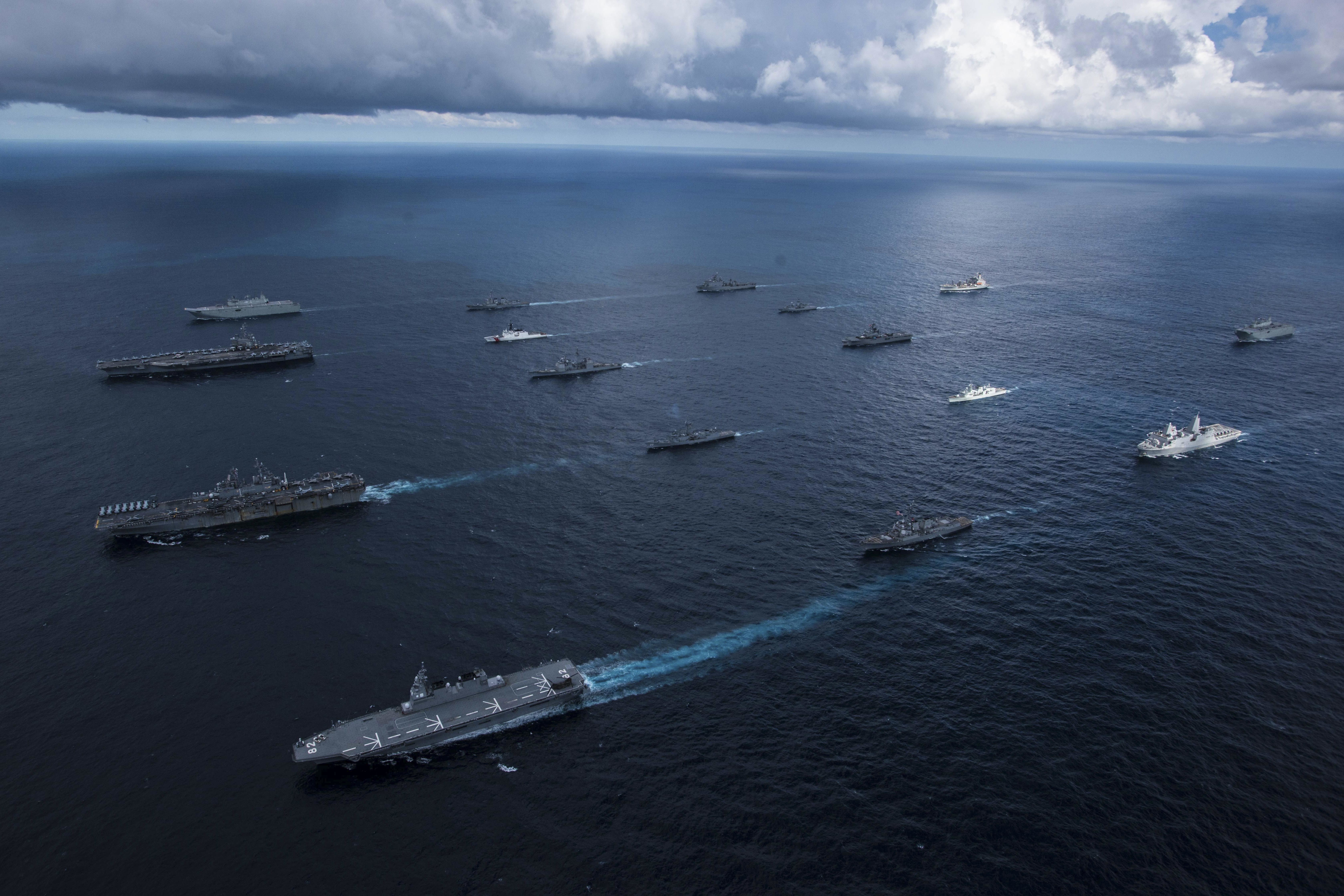 Navy and Coast Guard ships sail in formation with Australian, Canadian