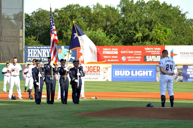 The 433rd Airlift Wing Honor Guard performs a flag ceremony at the San Antonio Missions baseball team’s 433rd Airlift Wing Night game July 13, 2019 at Nelson W. Wolff Municipal Stadium.