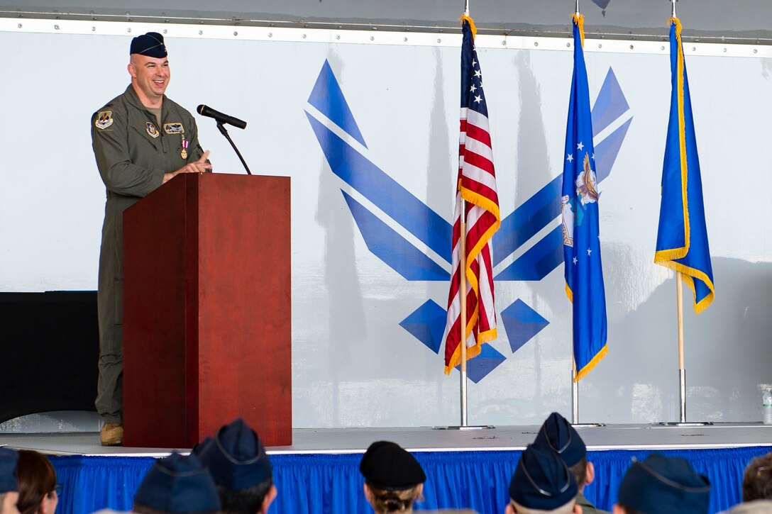 Col. Gerald Cook, 476th Fighter Group commander, speaks during change of command ceremony, July 14, 2019, at Moody Air Force Base, Ga. The ceremony is a military tradition that represents a formal transfer of a unit’s authority and responsibility from one commander to another. (U.S. Air Force photo by Airman Azaria E. Foster)