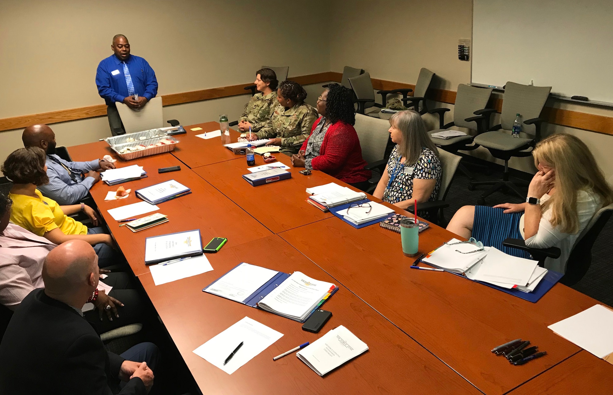 Air Force Services Center Lodging Management Specialist Daran Steele leads a discussion on Innkeeper Award evaluations in a final meeting before teams began their base visits. Seven installations -- three large and four small -- are in the running for this year's Innkeeper Awards. (U.S. Air Force photo by Armando Perez)