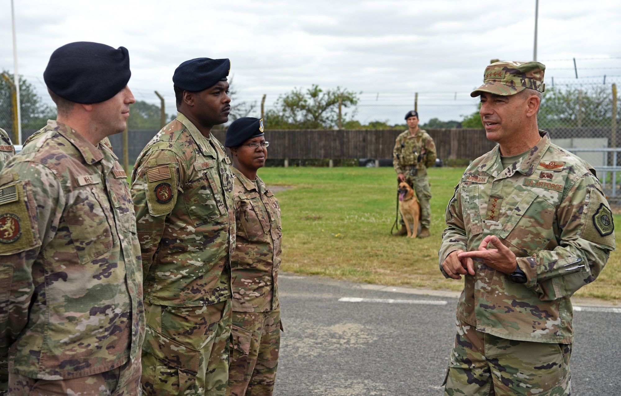 U.S. Air Force Gen. Jeff Harrigian, U.S. Air Forces in Europe – Air Forces Africa commander, discusses security measures with members of the 100th Security Forces Squadron at RAF Mildenhall, England, July 15, 2019. Harrigian made his first visit to RAF Mildenhall since assuming command in May 2019, speaking to Airmen on the importance of their mission and highlighting his vision. (U.S. Air Force photo by Airman 1st Class Brandon Esau)