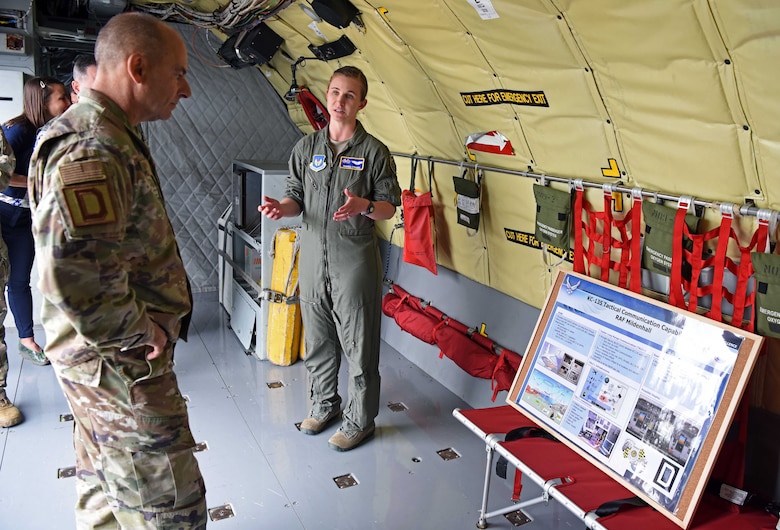 U.S. Air Force Gen. Jeff Harrigian, U.S. Air Forces in Europe – Air Forces Africa commander, receives a KC-135 Stratotanker briefing from Capt. Marissa “Doom” Strauss, 351st Air Refueling Squadron weapons officer, during a visit to RAF Mildenhall, England, July 15, 2019. During the visit, Harrigian introduced his three priorities as USAFE-AFAFRICA commander – readiness, posture and partnerships. (U.S. Air Force photo by Airman 1st Class Brandon Esau)