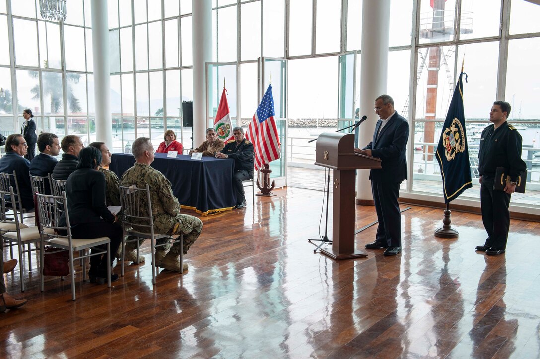 Krishna Urs, U.S. Ambassador to Peru, speaks during a closing ceremony.