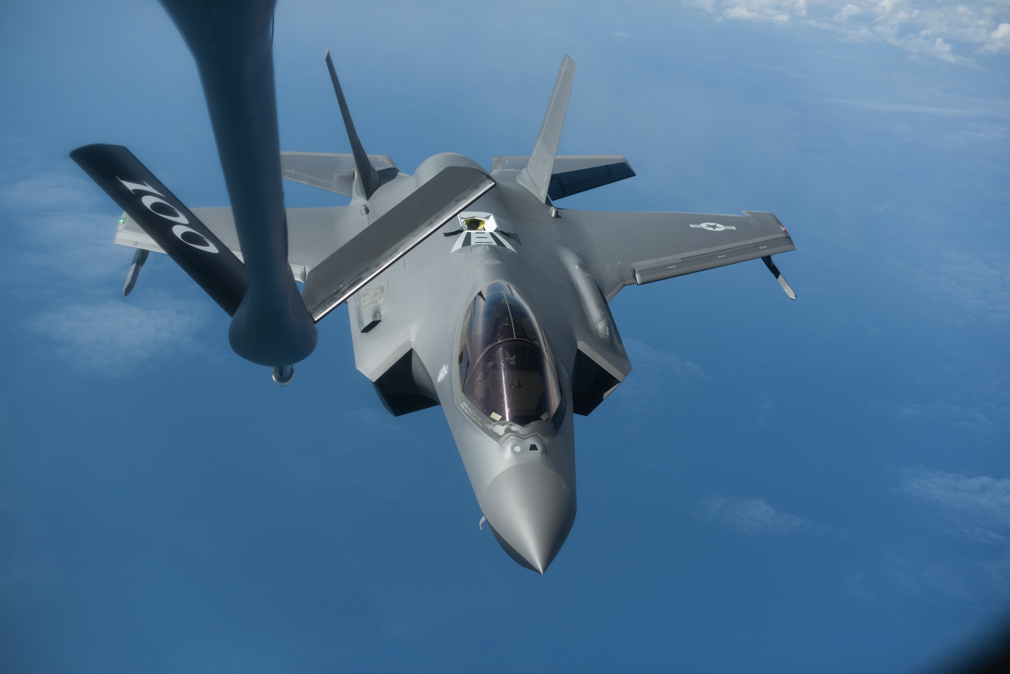 A U.S. Air Force F-35A Lighting II assigned to the 388th Fighter Wing, Hill Air Force Base, Utah, departs from a KC-135 Stratotanker assigned to the 351st Air Refueling Squadron, RAF Mildenhall, England, after receiving fuel over the Baltic Sea July 13, 2019. The F-35 conducted training with other Europe-based aircraft to demonstrate U.S. commitment to the security and stability of Europe. (U.S. Air Force photo by Airman 1st Class Joseph Barron)