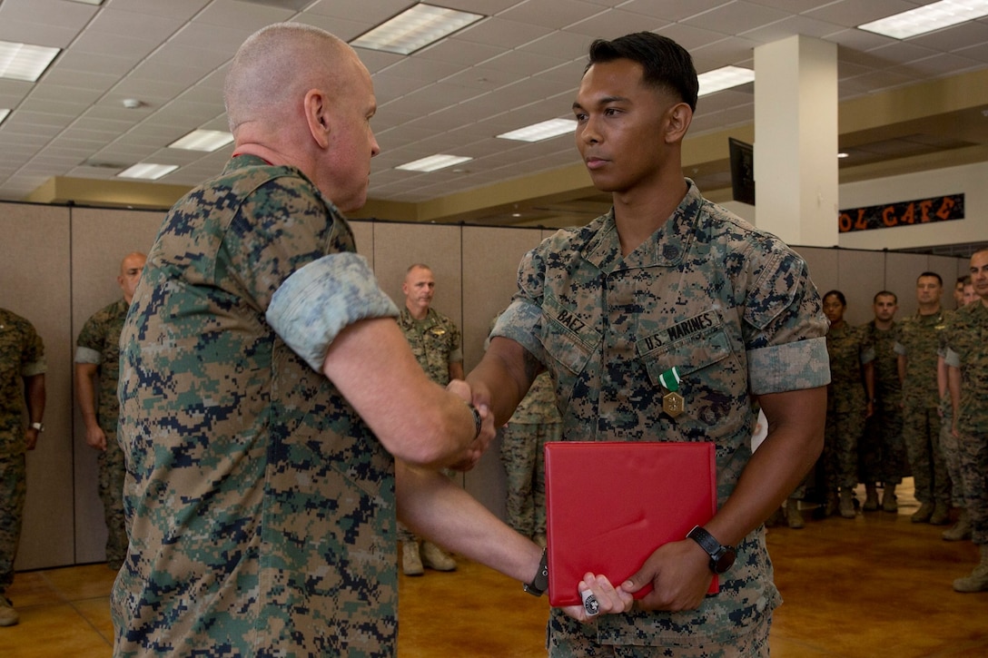 SSgt Michael Baez was awarded with the Navy and Marine Corps Commendation Medal as his tour in Miami came to an end, July 3, 2019.