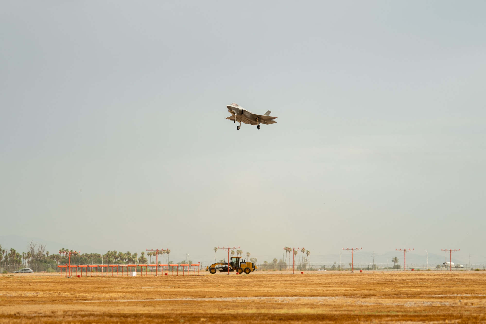 An F-35A Lightning II assigned to the 63rd Fighter Squadron prepares to land July 12, 2019, at Luke Air Force Base, Ariz. Luke is home to more than 90 F-35s, making it the largest F-35 training base in the Air Education Training Command. (U.S. Air Force photo by Airman 1st Class Aspen Reid)