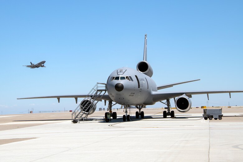 U.S. Air Force KC-10 Extender rests on the flight line July 11, 2019 at Travis Air Force Base, California. Although the KC-l0’s primary mission is aerial refueling, it can combine the tasks of a tanker and cargo aircraft by refueling fighters while simultaneously carrying support personnel and equipment. (U.S. Air Force photo by Heide Couch)