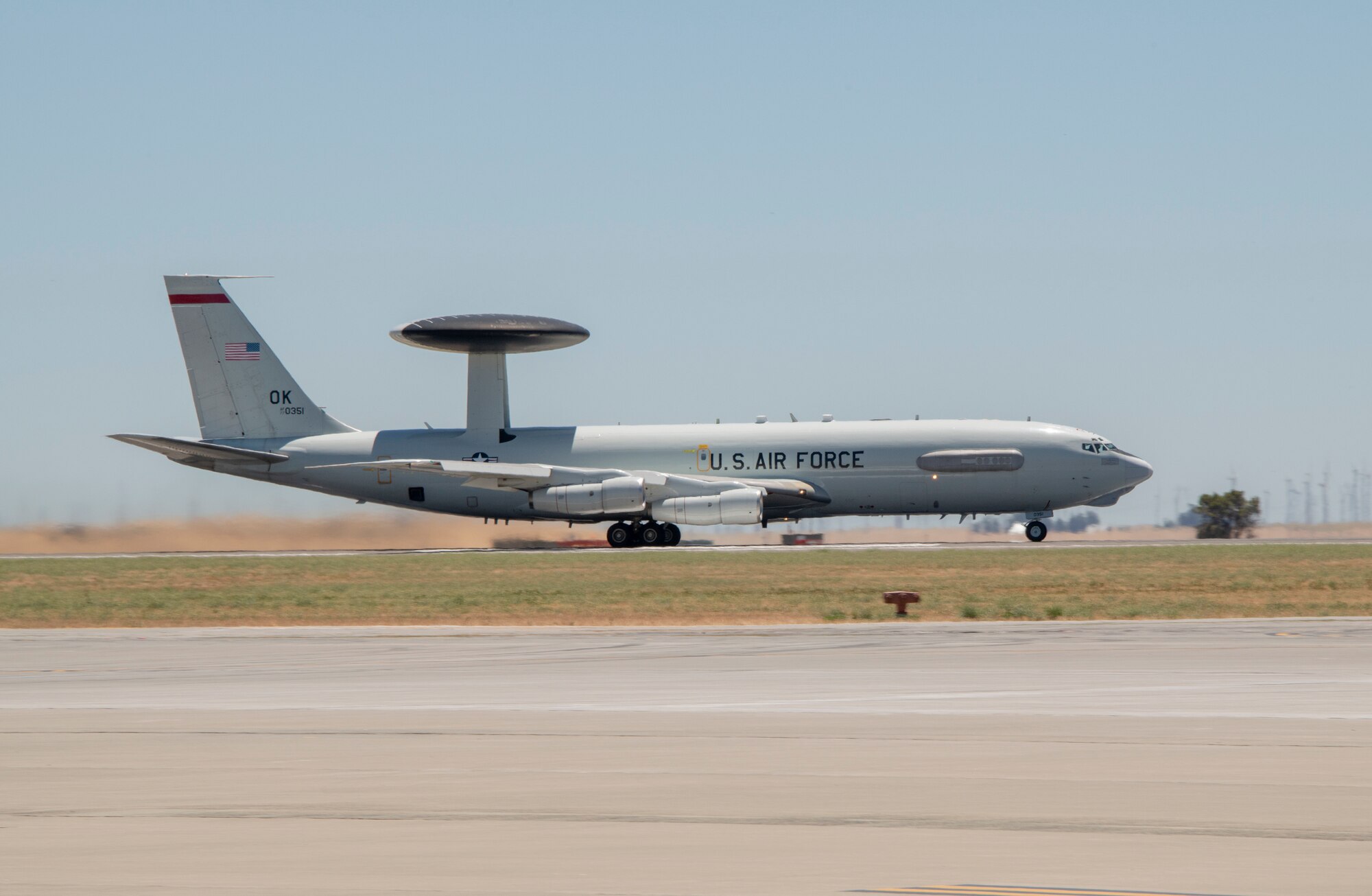 An E-3 Sentry Airborne Warning and Control System aircraft departs July 11, 2019, at Travis Air Force Base, California. The aircraft is equipped with a 30-foot-wide radar subsystem that permits surveillance up to the Earth's stratosphere and is assigned to Tinker Air Force Base, Oklahoma. (U.S. Air Force photo by Heide Couch)
