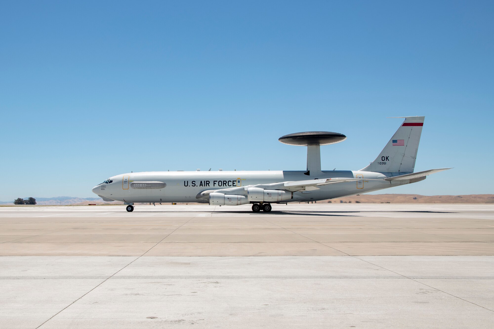 An E-3 Sentry Airborne Warning and Control System aircraft departs July 11, 2019, at Travis Air Force Base, California. The aircraft is equipped with a 30-foot-wide radar subsystem that permits surveillance up to the Earth's stratosphere and is assigned to Tinker Air Force Base, Oklahoma. (U.S. Air Force photo by Heide Couch)