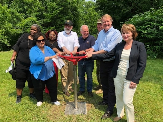 PITTSBURGH – After days of heavy rain and storms in the area, the sun shined brightly on the ribbon cutting, or more correctly stated, valve-turning ceremony for the completion of the Sheraden Park Aquatic Ecosystem Restoration Project, June 1.