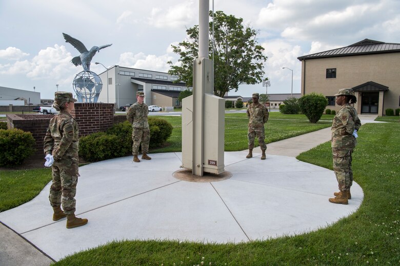 Members of the Air Force Mortuary Affairs Operations conduct a retreat ceremony July 11, 2019, at Dover Air Force Base, Del. AFMAO’s mission is to fulfill the nation’s sacred commitment of ensuring dignity, honor and respect to the fallen and care, service and support to their families. (U.S. Air Force photo by Senior Airman Christopher Quail)