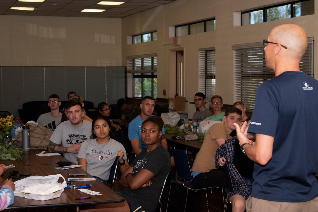 U.S. Air Force Capt. Kevin Hostettler, 60th Air Mobility Wing chaplain, provides instructions to nearly four dozen Airmen inside the First Street Chapel July 12, 2019, at Travis Air Force Base, California, prior to traveling to Yosemite National Park. The Airmen, from 21 organizations, participated in a 14.57 mile hike to Cloud’s Rest, 9,926 feet above sea level. The hike was organized to enhance the Airmen’s physical, mental and spiritual resiliency. (U.S. Air Fore photo by Tech. Sgt. James Hodgman)
