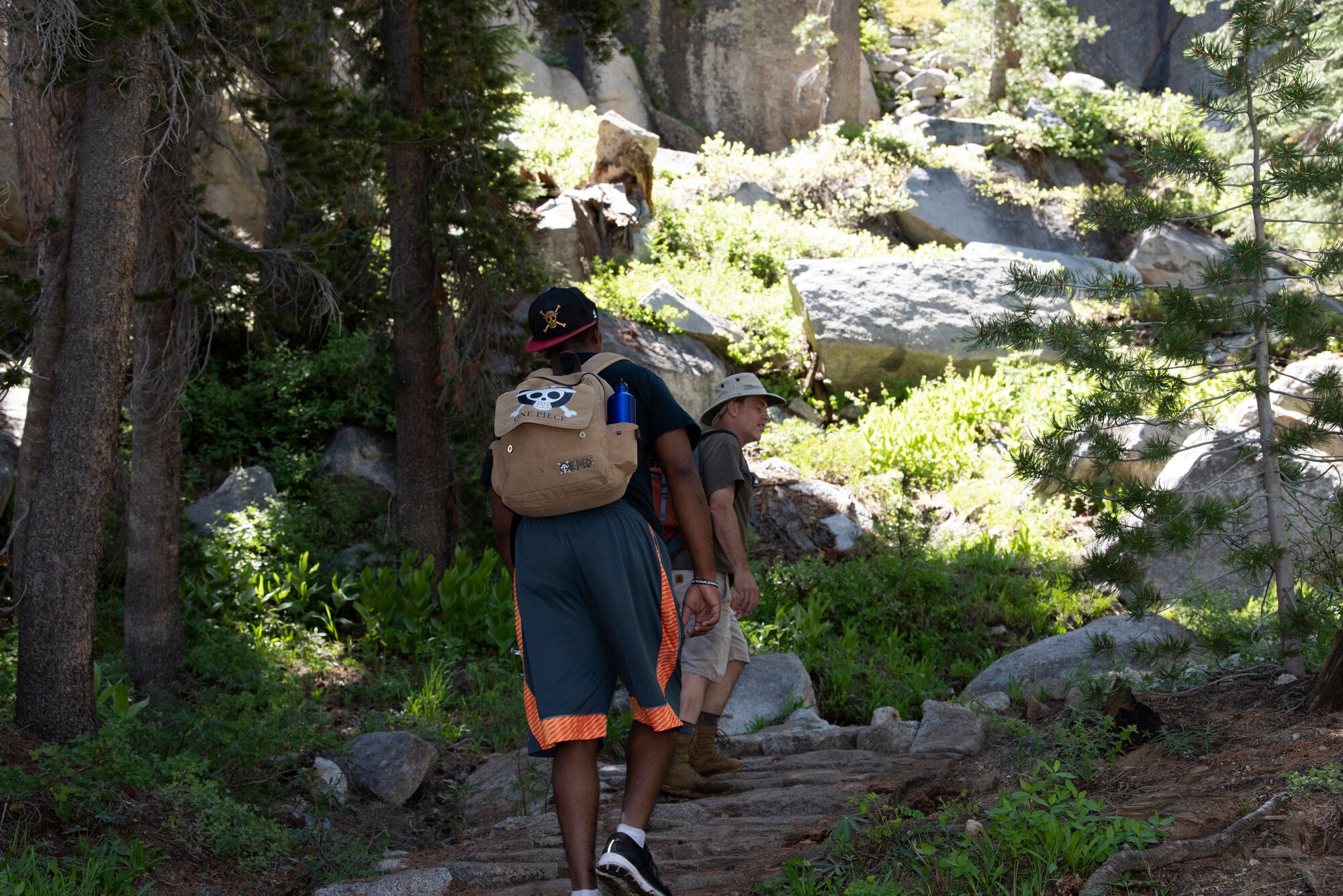 U.S. Air Force Capt. Ayodeji Alaketu, 60th Medical Operations Squadron family resident physician, hikes Cloud’s Rest July 13, 2019, at Yosemite National Park, California. Alaketu and 41 other Airmen from Travis Air Force Base, California, hiked to Cloud’s Rest covering 14.57 miles as they climbed to 9,926 feet above sea level. The hike was organized to enhance the Airmen’s physical, mental and spiritual resiliency. (U.S. Air Fore photo by Tech. Sgt. James Hodgman)