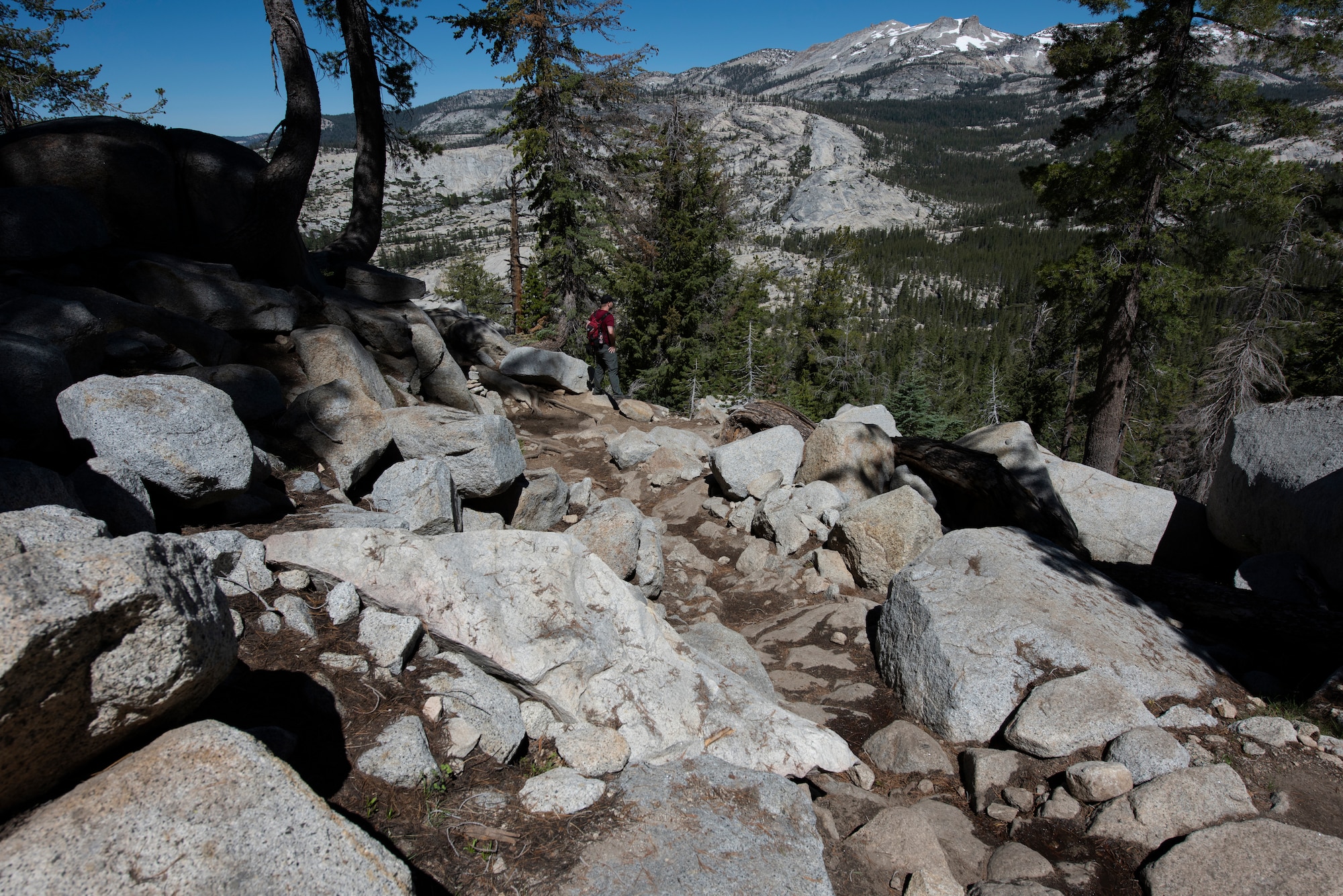 U.S. Air Force Staff Sgt. Jarret Redhair, 22nd Airlift Squadron C-5M Super Galaxy flight engineer, waits for his hiking partner July 13, 2019, at Yosemite National Park, California. Nearly four dozen Airmen from Travis Air Force Base, California, hiked to Cloud’s Rest covering 14.57 miles as they climbed to 9,926 feet above sea level. The hike was organized to enhance the Airmen’s physical, mental and spiritual resiliency. (U.S. Air Fore photo by Tech. Sgt. James Hodgman)