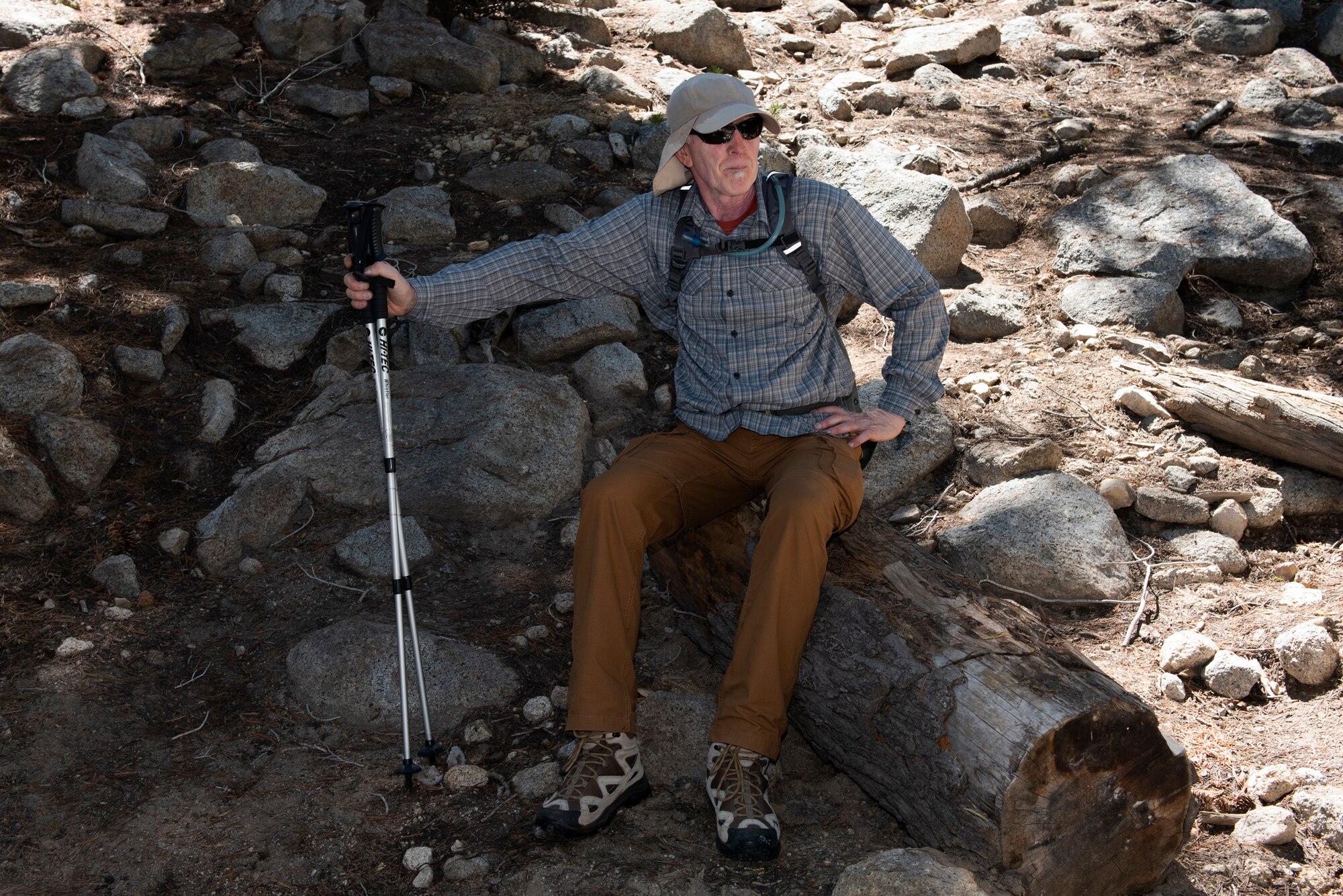 Retired U.S. Air Force Master Sgt. Terry Hendricksen, 60th Force Support Squadron outdoor recreation equipment repair technician, takes a break from hiking July 13, 2019, at Yosemite National Park, California. Hendricksen joined nearly four dozen Airmen from Travis Air Force Base, California, to hike to Cloud’s Rest covering 14.57 miles as they climbed to 9,926 feet above sea level. The hike was organized to enhance the Airmen’s physical, mental and spiritual resiliency. (U.S. Air Fore photo by Tech. Sgt. James Hodgman)